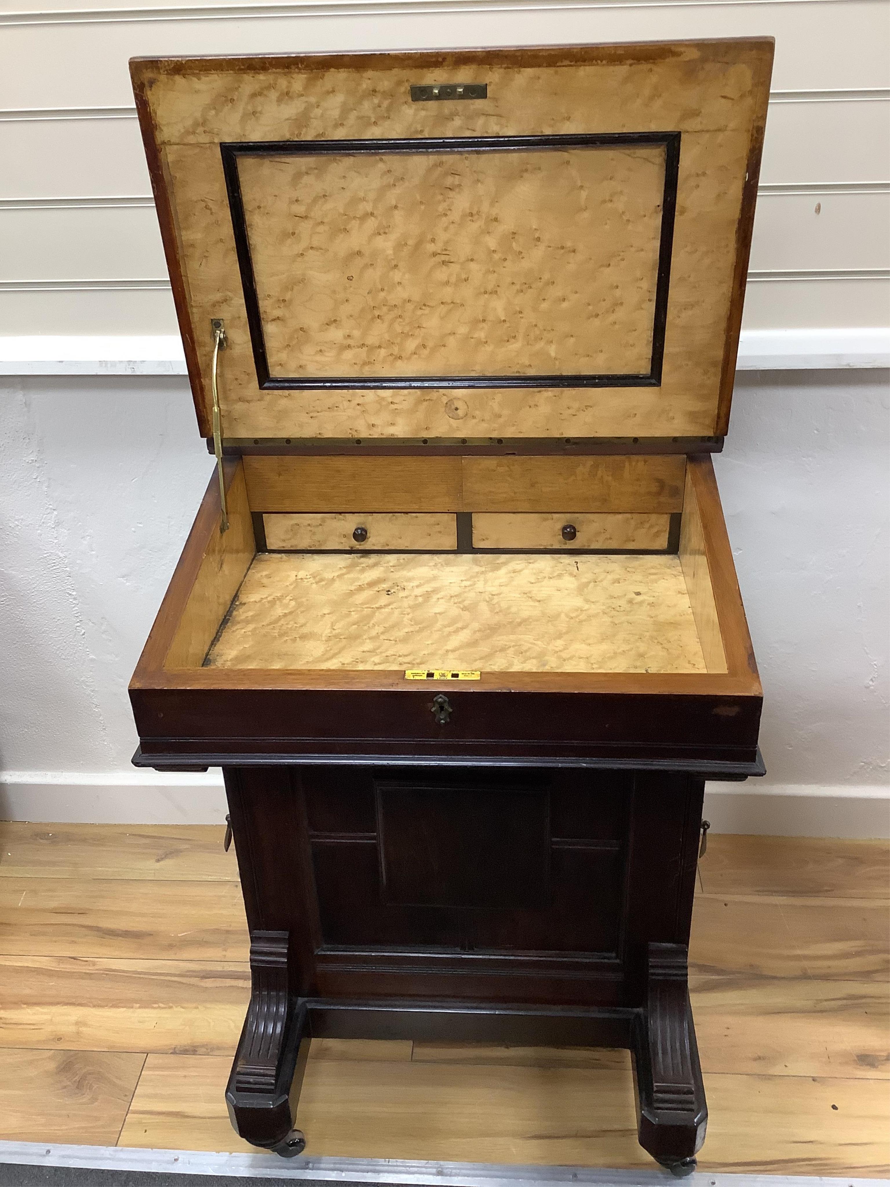 A late Victorian mahogany davenport, width 55cm, depth 56cm, height 93cm. Condition - fair